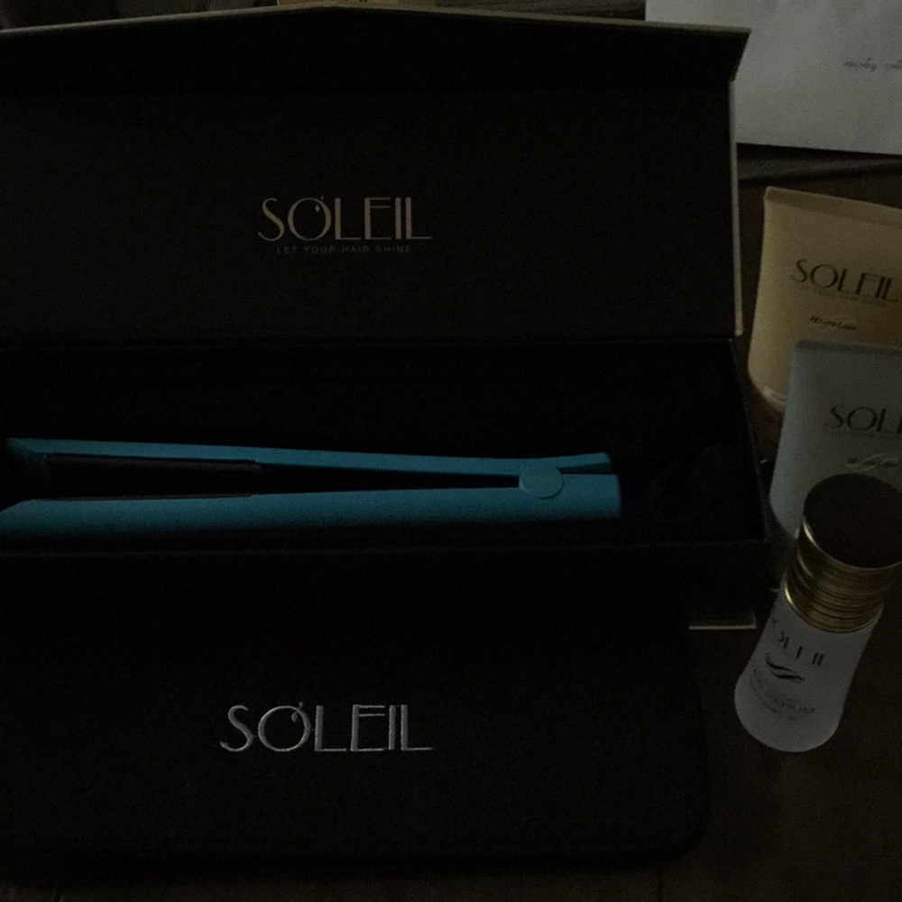 Soleil flat iron with hair products